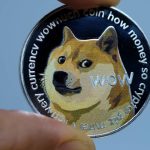 106869851-1618607422719-gettyimages-1299388450-yn_dogecoinillustration_001
