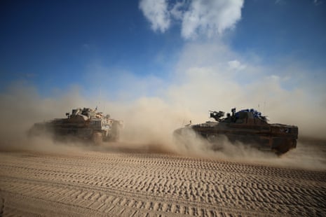 Israeli troops are seen near the border with Gaza, in southern Israel. The Israeli army announced on Wednesday that it has gained full operational control of the Philadelphi Corridor.